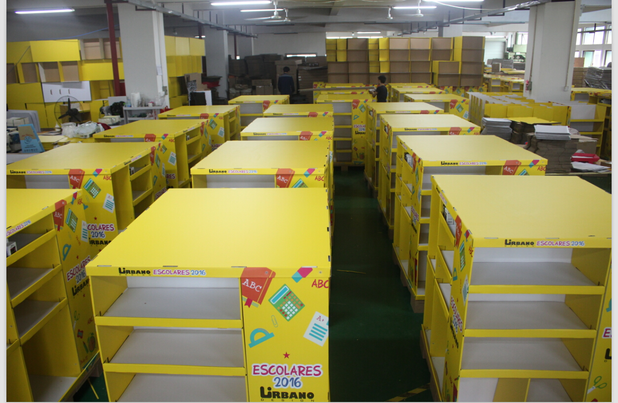 A stack of cardboard floor displays in a warehouse, showing the concept of quantity.