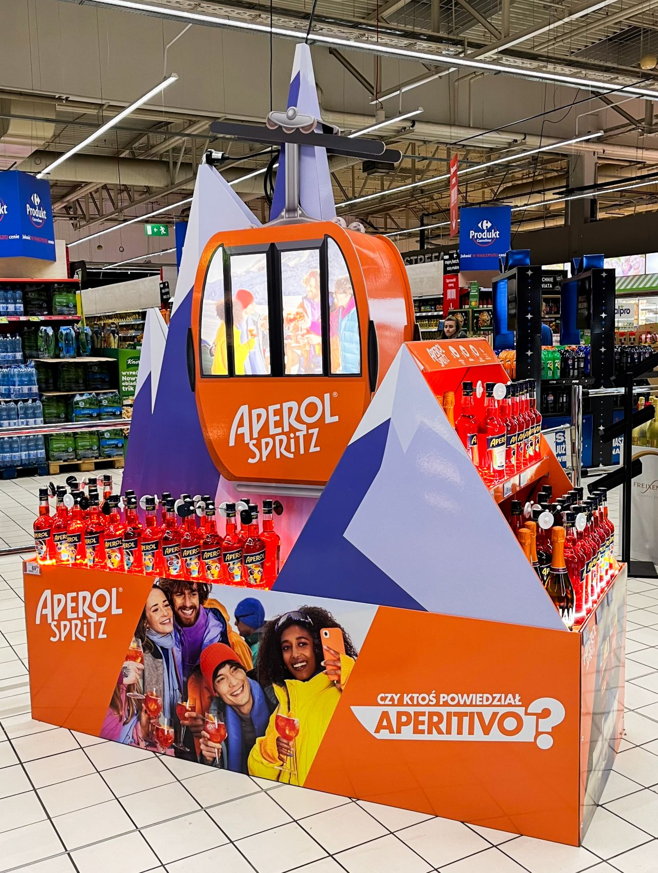 a creative and colorful cardboard display stand in a retail store