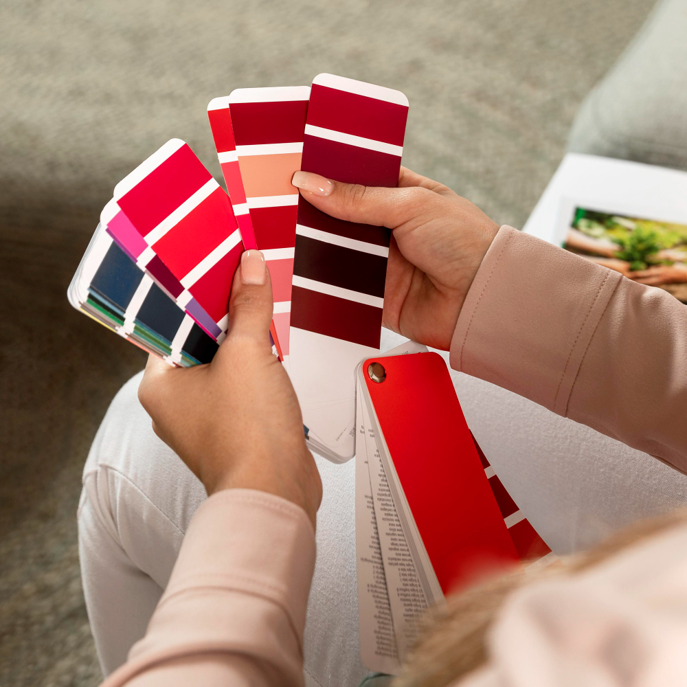 a color calibration tool showing brand color matching on a cardboard display