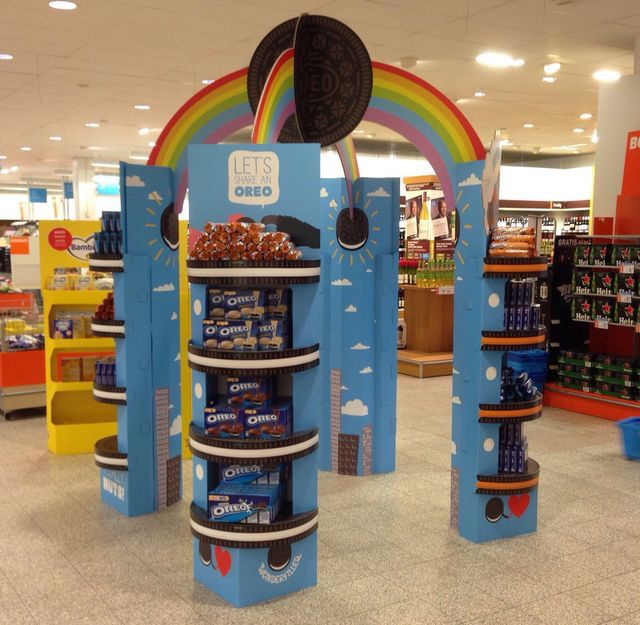A perfectly assembled, fully stocked cardboard display standing proudly in a store.