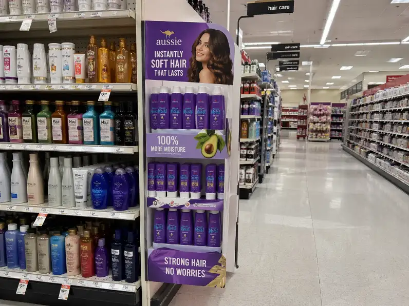 shopper distance view of a sidekick display sample in retail aisle