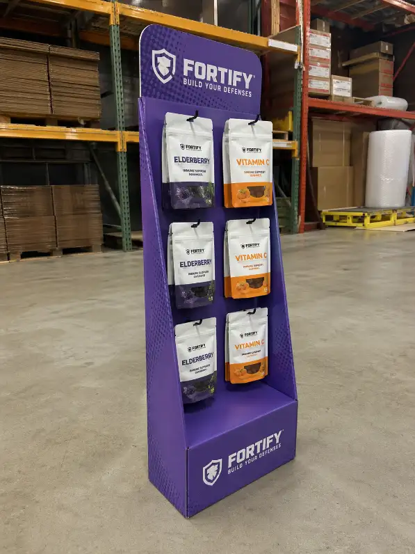 real product fit test on a sidekick display sample with hanging packaged goods